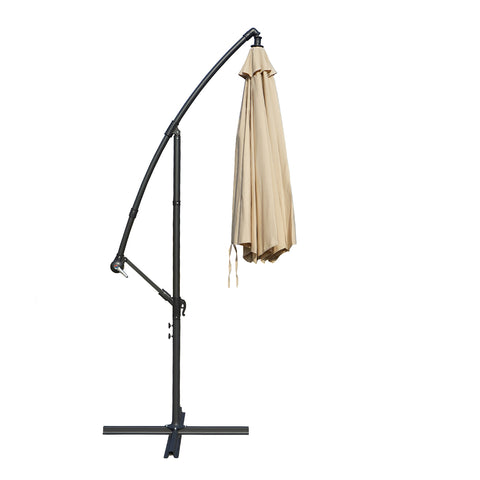 A side - view of a collapsed outdoor offset umbrella with a vibrant beige canopy, mounted on a sturdy black stand with adjustable features. Folded beige Patio Umbrella: Compact and Sturdy Design. Collapsed Outdoor Umbrella: Beige Canopy with Adjustable Stand. beige patio umbrella, cantilever umbrella, folded umbrella, outdoor umbrella, adjustable stand, umbrella storage.