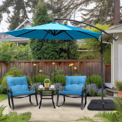 A blue cantilever patio umbrella providing shade over two cushioned outdoor chairs and a small table in a backyard setting. The umbrella is mounted on a black stand with a base, surrounded by greenery and a wooden fence. Backyard Cantilever Umbrella: Shade for Relaxing Outdoors. Outdoor Offset Umbrella: Enhance Your Patio Retreat. cantilever umbrella, patio umbrella, outdoor umbrella, backyard umbrella, patio furniture, outdoor relaxation