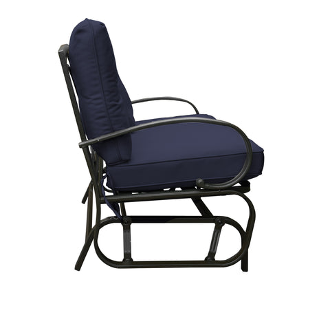 Side view of a glider chair with a navy blue cushioned seat and backrest. The chair features a sturdy metal frame with curved armrests and a slatted lower frame, designed for comfortable outdoor or indoor relaxation. glider chair, navy blue cushion, metal frame, curved armrests, relaxation.