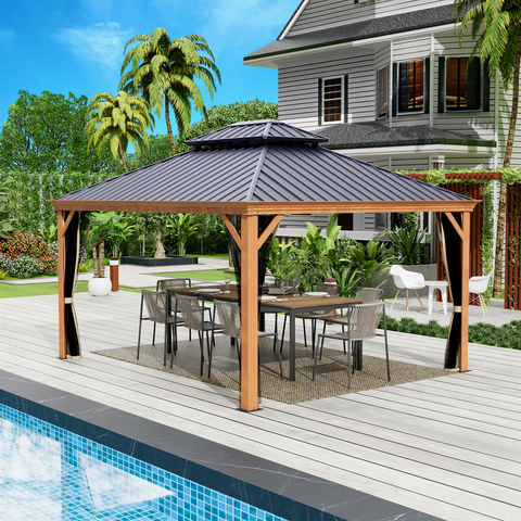 An outdoor aluminum gazebo with a wood - grain finish, set against a backdrop of a house, palm trees, and a swimming pool. The dark - hued metal roof contrasts with the wooden - look frame. Underneath the gazebo, there is an outdoor dining setup with a table and chairs, suggesting a space for relaxation and socializing. Elegant Outdoor Aluminum Wood - Grain Gazebo for Relaxation and Dining. outdoor aluminum gazebo, wood - grain finish, dark metal roof, outdoor dining, relaxation space