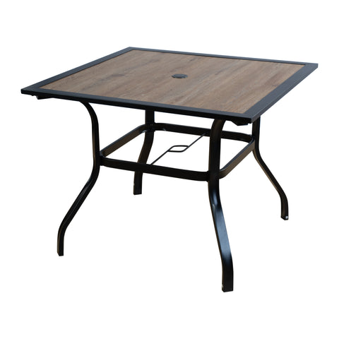 A square outdoor dining table with a faux-wood finish top and a dark black metal frame. It features an umbrella hole in the center, perfect for outdoor dining set-ups. outdoor dining table, square table, black metal frame, faux-wood top, umbrella hole.