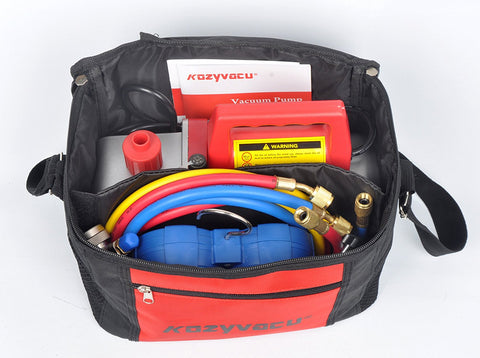 KOZYVACU vacuum pump kit packed in a carrying bag with manifold gauge, hoses, and user guide. KOZYVACU vacuum pump, carrying bag, manifold gauge, hoses, user guide, HVAC tool.
KOZYVACU Vacuum Pump Kit with Carrying Bag and Manifold Gauge. KOZYVACU vacuum pump, carrying bag, manifold gauge, hoses, user guide, HVAC tool.