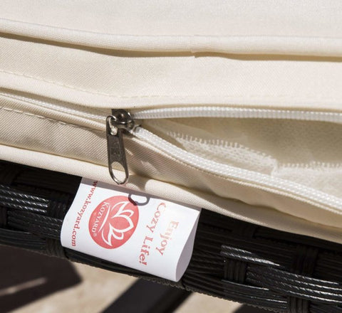 Detail of Cushion with Zipper and Label
alt text:Close - up of a beige cushion featuring a zipper and a label that reads "Comfort Life". Keywords: cushion detail, zipper, comfort life label