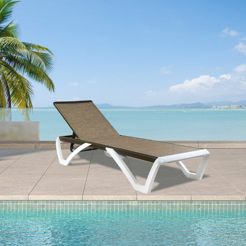 A stylish outdoor lounge bed with a beige woven surface and white - colored frame is positioned by a swimming pool, with a scenic view of the sea and palm trees in the background.Stylish Outdoor Lounge Bed by the Poolside. outdoor lounge bed, poolside furniture, beige woven surface, white frame, seaside view