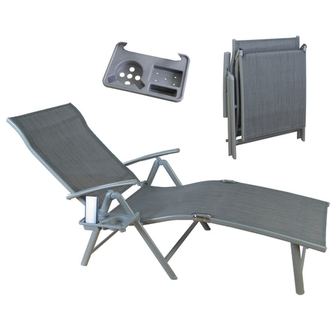 A gray foldable lounge chair with a modern design. The chair comes with a detachable cup-holder tray that can be attached to the armrest. The image also shows the chair in a folded-up position, highlighting its portability and easy storage feature. gray foldable lounge chair, detachable cup-holder, easy storage, portable lounge chair.
