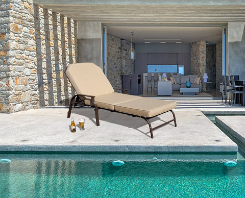 Comfortable Outdoor Lounge Chair by the Pool
alt text:A beige cushioned outdoor lounge chair positioned by a pool, with a bottle of beer and a glass of beer beside it, and a modern indoor living space visible in the background. Keywords: outdoor lounge chair, poolside, modern living space