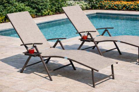 Kozyard aluminum outdoor chaise lounge chairs with adjustable backrests by a backyard pool
