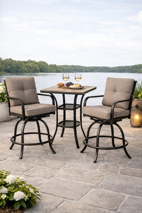 Kozyard Outdoor patio bar set with cushioned swivel bar chairs and square bar-height table by the lake, featuring sturdy metal frames and a relaxing American outdoor living setting
