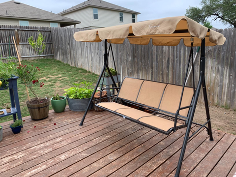 Kozyard Belle Outdoor Porch Swing: Smooth Sway, Flexible Shade 1 Beige canopy porch swing with a strong steel frame and airy sling seat, delivering cool shaded comfort for three on a backyard deck—ideal for daily lounging and outdoor entertaining