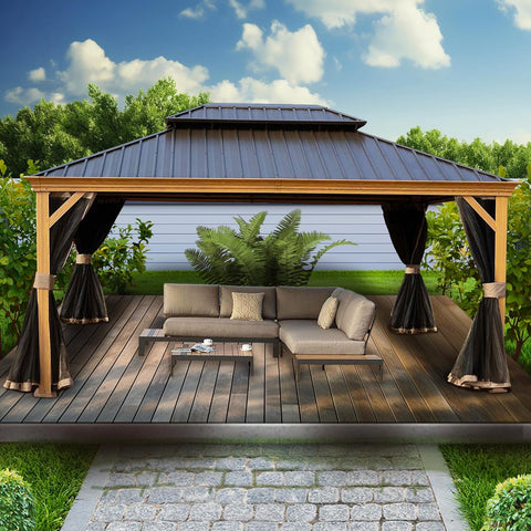An inviting outdoor aluminum gazebo with a wood - grain finish, featuring a dark metal roof. Set on a wooden deck, it offers a cozy relaxation area with a modern sectional sofa adorned with decorative pillows, a coffee table, and elegant black curtains. The background includes lush greenery and a white wall, enhancing the serene outdoor ambiance.Cozy Outdoor Aluminum Wood - Grain Gazebo for Relaxation.outdoor aluminum gazebo, wood - grain finish, dark metal roof, relaxation area, wooden deck