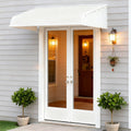 Kozyard 66x40 window and door awning with dual side wings installed above double French doors, featuring aluminum frame and impact-resistant PVC panels for rain, snow, UV, and sun protection—ideal canopy for home entrances, patios, and outdoor weather protection.