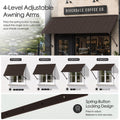 Kozyard adjustable metal awning featuring 4-level awning arms with spring-button locking for customized shade angles and coverage. This brown wall mounted outdoor canopy can be positioned at multiple projections to block sun and protect windows, doors, storefronts and patios. Durable fixed awning design offers flexible residential or commercial shade with secure adjustable support arms.