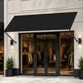 Kozyard 108-inch black metal door awning mounted over a modern storefront entry. High-performance outdoor window canopy and patio door shelter designed for residential and commercial exterior applications. Features a heavy-duty powder-coated iron structure that provides stylish sun protection, rain shelter, and all-weather resistance. Perfect for upgrading home curb appeal, shop front door awnings, coffee shop facades, and outdoor entryway protection.
