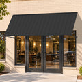 Kozyard 9 FT metal awning installed above a coffee shop entrance, providing outdoor sun shade and rain protection for storefront windows and doors. This wall mounted outdoor canopy features a durable metal roof panel, adjustable support arms, and a modern sloped design. Ideal for commercial storefront awnings, restaurant entrance canopies, cafe patio covers, residential door awnings, and exterior window shade protection.