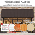Kozyard 149 inch wall mounted metal awning designed for installation on siding, brick, wood, and concrete walls using appropriate mounting hardware. The illustrated commercial storefront installation demonstrates compatibility with different exterior wall surfaces, including uneven and stepped siding. This extra wide outdoor canopy provides practical overhead coverage for retail entrances, restaurant storefronts, commercial building facades, residential patio doors, garage openings, and other exterior appli