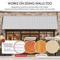 Kozyard 149 inch wall mounted metal awning designed for installation on siding, brick, wood, and concrete walls using appropriate mounting hardware. The illustrated commercial storefront installation demonstrates compatibility with different exterior wall surfaces, including uneven and stepped siding. This extra wide outdoor canopy provides practical overhead coverage for retail entrances, restaurant storefronts, commercial building facades, residential patio doors, garage openings, and other exterior appli