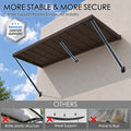 Kozyard 68 inch brown metal awning with extra-deep 43 5/16 inch coverage and adjustable wall mounted support arms for customized shade. Constructed from powder-coated iron, this fixed outdoor canopy provides about 28 sq. ft. of protection from sun and rain, making it ideal for windows, doors, patios, entryways, storefronts and smaller residential or commercial exterior areas.