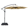 Beige Cantilever Patio Umbrella with Weighted Base. Beige cantilever patio umbrella with a sturdy weighted base, perfect for outdoor shade and garden decor. Cantilever umbrella, patio umbrella, outdoor shade, garden decor, beige umbrella, weighted base