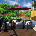 A red cantilever patio umbrella provides shade over a black outdoor furniture set on a wooden deck. The setting is surrounded by lush greenery, colorful flowers, and a brick wall, creating a cozy outdoor relaxation spot.
Red Patio Umbrella: Shade for a Lush Outdoor Retreat. Outdoor Offset Umbrella: Enhance Your Garden Seating Area. red patio umbrella, outdoor umbrella, cantilever umbrella, outdoor seating area, garden shade, wicker furniture.