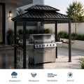 Kozyard all-weather suitable hardtop grill gazebo shown in a split rain and sun protective comparison. Highlights premium waterproof, windproof, ventilated, and anti-UV sunshade capabilities. This heavy-duty metal roof barbecue canopy shields your expensive stainless steel gas grill and cooking station from heavy downpours and harsh summer sunlight. Reliable outdoor shelter ensuring year-round backyard cooking and grilling performance.
