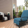 A blue-colored outdoor lounge chair with cushioned seating and armrests sits on a wooden deck. Adjacent to it is a wicker chair adorned with a striped throw blanket and a small wicker side table holding a vase of white flowers. The setting includes a house with siding, a railing, and a backdrop of trees.
Blue Outdoor Lounge Chair for Relaxing on the Deck.
blue outdoor lounge chair, deck furniture, outdoor relaxation, cushioned seating

