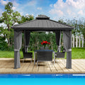 Elegant Gray Gazebo for Poolside Entertaining
alt text：A gray gazebo with draped curtains, set by a pool and furnished with a dining table, chairs, and a vase of red flowers, perfect for outdoor gatherings. Keywords: gray gazebo, poolside, outdoor dining, curtains
