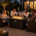 Kozyard propane fire pit table creates a cozy outdoor gathering space for family and friends, combining the warmth and ambiance of an outdoor gas fire pit with the functionality of a modern patio table. The rectangular gray wicker fire table features a spacious tabletop, clear glass wind guard, adjustable propane flame and contemporary outdoor furniture design. Ideal for backyard conversations, patio entertaining and cool evenings, this Kozyard gas fire table brings comfortable fireside seating to outdoor l