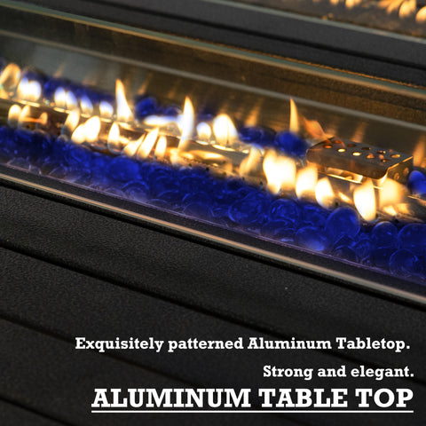 Kozyard 50,000 BTU Outdoor Wicker Patio Propane Gas Fire Pit Table w/Aluminum Tabletop, Glass Wind Guard, Clear Glass Rocks, Cover, Slide Out Tank Holder, and Lid (2 Color Options)