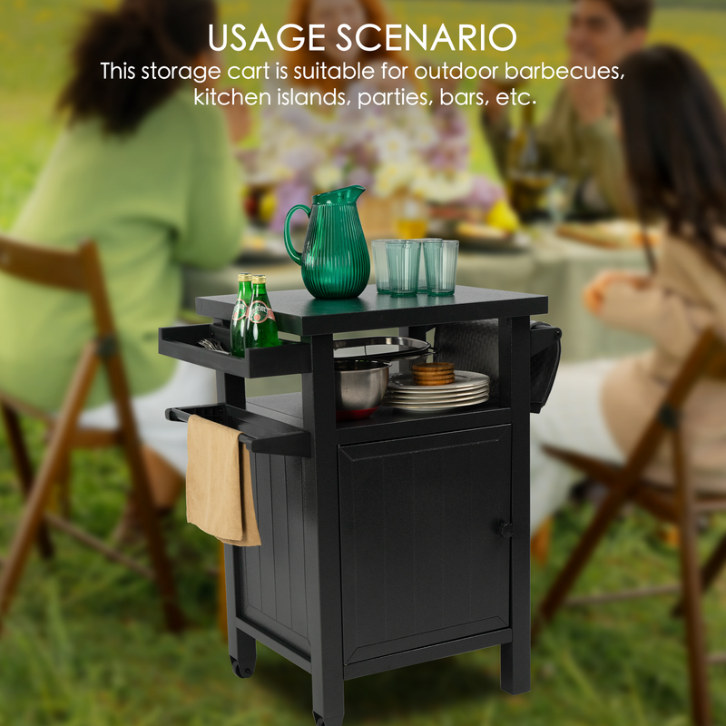 A black BBQ grill storage cart/bin is featured in an outdoor setting with people dining in the background. The cart holds various items like a green pitcher, glasses, a bottle, a mixing bowl, and plates. A napkin hangs from one of its sides. The text at the top reads "USAGE SCENARIO This storage cart is suitable for outdoor barbecues, kitchen islands, parties, bars, etc."Versatile BBQ Grill Storage Cart for Multiple Occasions. BBQ grill storage cart, storage bin, outdoor barbecues, kitchen islands, parties