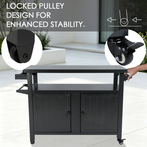 Kozyard movable large outdoor prep table demonstrating the locked pulley design for maximum stability during food preparation. The technical graphic highlights both the standard caster wheel and the premium step-lock brake wheel. A hand holds the side handle bar, showing how easily this 60 lbs powder-coated metal BBQ grill cart transitions from a mobile serving cart to a rock-solid stationary prep station.
