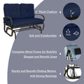 A glider chair with 4-inch thick navy blue cushions, offering soft and comfortable seating. It features a sturdy metal frame for stability, with elegant and smooth lines. The chair also provides a sturdy and smooth gliding motion thanks to its strong bearings. navy blue-cushioned glider chair, 4-inch thick cushions, metal frame, smooth gliding motion, comfortable seating.