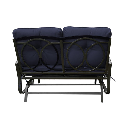 A glider bench with vibrant navy blue cushions, featuring an elegant black metal frame with circular cut - out designs on the backrest. The bench is designed for a smooth gliding motion, providing a comfortable and stylish seating option for outdoor spaces. Navy Blue - Cushioned Glider Bench with Circular Design. navy blue - cushioned glider bench, black metal frame, circular backrest design, smooth gliding motion, outdoor seating.