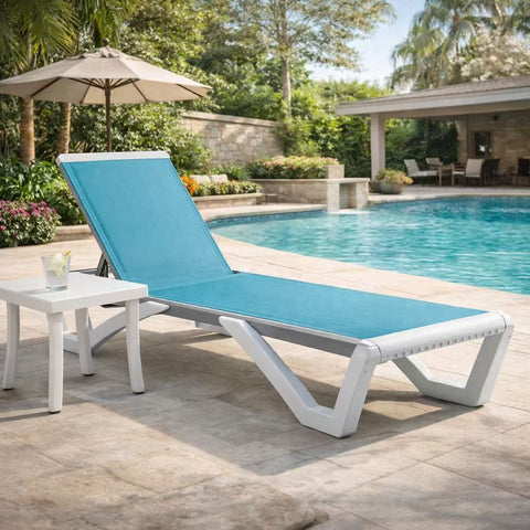 Kozyard Outdoor Poolside Chaise Lounge with Side Table: Adjustable-recline design, blue durable Textilene fabric & sturdy metal frame—includes compact side table for poolside/patio use, featuring weather-resistant outdoor upholstery.

