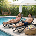 Kozyard outdoor lounge chairs in use: comfortable poolside seating for outdoor leisure, featuring weather-resistant fabric & sturdy frame for enjoyable outdoor gatherings.
