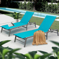 Two Chic Aqua Blue Outdoor Lounge Chairs Set by Pool
alt text：Two stylish aqua blue outdoor lounge chairs , placed by a pool and accessorized with a magazine, drinks, and a throw blanket. Keywords: aqua blue outdoor lounge chairs, poolside, patio furniture.
