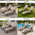 Kozyard uv resistant outdoor planter pot large deck patio garden flower plant pot container. A neat row of large elegant fluted flowerpots arranged along a sunny luxury estate backyard stone walkway, housing vibrant tropical palms and bird of paradise plants. Showcasing superior sun protection, heat resistance, fade proof engineering, and stunning structural landscaping capabilities for residential open air decks, resort hotels, commercial buildings, and country club gardens.