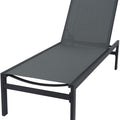 A gray outdoor lounge chair with a black metal frame. The chair features a reclining backrest and a sleek, minimalist design, suitable for relaxing outdoors. Gray Outdoor Lounge Chair: Sleek and Comfortable for Outdoor Relaxation. gray outdoor lounge chair, black - framed lounge chair, outdoor relaxation furniture, minimalist lounge chair.