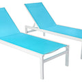 Two outdoor lounge chairs featuring bright blue fabric on white metal frames. The chairs are designed for relaxation, with adjustable backrests, perfect for poolside or patio use. Blue Outdoor Lounge Chairs: Relax in Style Outdoors. blue outdoor lounge chairs, white - framed lounge chairs, adjustable backrests, outdoor relaxation furniture.