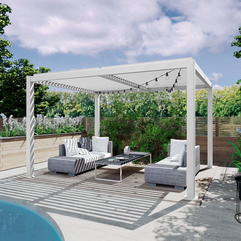 A sleek white louvered pergola provides shade over a modern outdoor lounge area. The setup includes stylish grey wicker sofas with white cushions, a contemporary coffee table, and string lights for ambiance. Surrounded by greenery and near a pool, it offers a chic spot for relaxation. White Louvered Pergola for Outdoor Lounge Oasis. louvered pergola, outdoor lounge, white pergola, wicker furniture, poolside relaxation.
