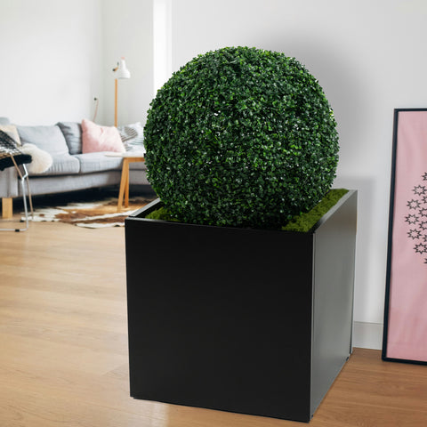 A black cube - shaped metal planter, made of steel, holding a lush, spherical green plant. It enhances modern interior decor, suitable for both indoor and outdoor use to display flowers or plants. Black Cube Metal Planter for Indoor and Outdoor Decor. cube metal planter, steel planter box, black steel flower pot.