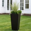 Kozyard tall outdoor planter provides a modern landscaping solution for ornamental grasses, shrubs, flowers and decorative greenery. The large tapered metal planter creates vertical visual interest for front yards, patios, porches, decks, entryways, gardens and walkways, combining generous planting space with a contemporary profile for residential and commercial outdoor plant displays.
