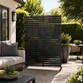 Kozyard large decorative outdoor planter pot and stylish front porch umbrella stand holder helper. This multifunctional fluted utility storage bucket is placed near a home entrance door, perfectly showcasing its versatility as both a elegant heavy duty flower container for front door plants and a waterproof modern rainwater catcher bin. Ideal for elevating home curb appeal, modern farmhouse entryway decor, and creating a welcoming residential outdoor patio experience all year round.