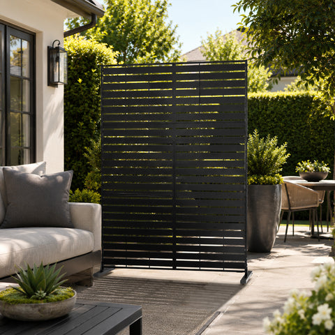 Kozyard large decorative outdoor planter pot and stylish front porch umbrella stand holder helper. This multifunctional fluted utility storage bucket is placed near a home entrance door, perfectly showcasing its versatility as both a elegant heavy duty flower container for front door plants and a waterproof modern rainwater catcher bin. Ideal for elevating home curb appeal, modern farmhouse entryway decor, and creating a welcoming residential outdoor patio experience all year round.