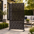 Kozyard large decorative outdoor planter pot and stylish front porch umbrella stand holder helper. This multifunctional fluted utility storage bucket is placed near a home entrance door, perfectly showcasing its versatility as both a elegant heavy duty flower container for front door plants and a waterproof modern rainwater catcher bin. Ideal for elevating home curb appeal, modern farmhouse entryway decor, and creating a welcoming residential outdoor patio experience all year round.