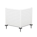 A white outdoor privacy fence with horizontal slats, supported by vertical posts. The fence is equipped with black metal stakes at the bottom for easy ground installation, making it suitable for defining spaces in gardens or patios.Elegant White Outdoor Privacy Fence. outdoor privacy fence, white fence, horizontal slat fence, garden fencing, easy - install fence. L shape.