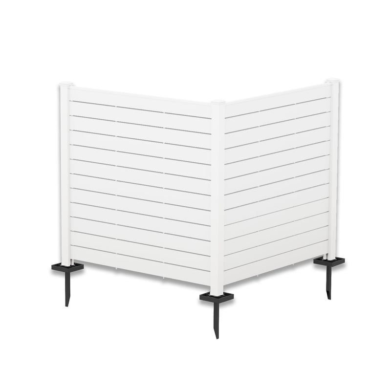 A white outdoor privacy fence with horizontal slats, supported by vertical posts. The fence is equipped with black metal stakes at the bottom for easy ground installation, making it suitable for defining spaces in gardens or patios.Elegant White Outdoor Privacy Fence. outdoor privacy fence, white fence, horizontal slat fence, garden fencing, easy - install fence. L shape.