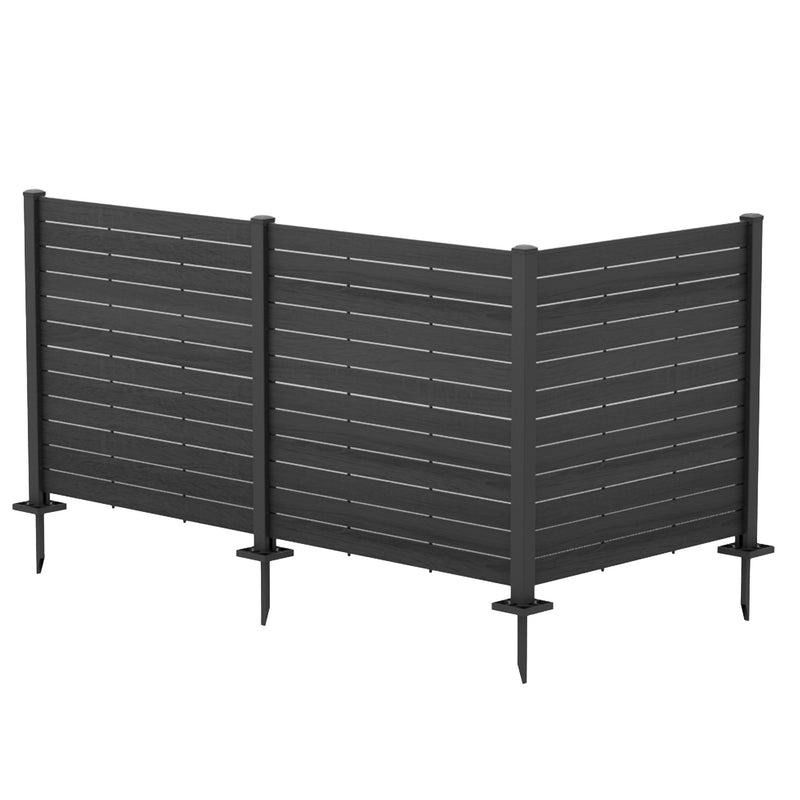 A modern outdoor privacy fence with a sleek, dark - colored design. The fence features horizontal slats and stands on sturdy posts with pointed stakes at the bottom, likely for easy ground installation. Sleek Modern Outdoor Privacy Fence. outdoor privacy fence, horizontal slat fence, dark - colored fence, garden fencing, easy - install fence. L shape.
