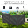 A 47 - inch tall outdoor privacy fence in dark color with wide slatted panels. It is used to conceal items like trash cans, air conditioning units, leaf piles, and garden tools, helping to keep the yard looking clean and tidy. The background shows a suburban setting with greenery and houses.Functional Outdoor Privacy Fence for Yard Cleanliness. outdoor privacy fence, yard organization, trash can cover, air conditioner enclosure, garden tool storage.