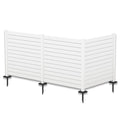 A white outdoor privacy fence with horizontal slats, supported by vertical posts. The fence is equipped with black metal stakes at the bottom for easy ground installation, making it suitable for defining spaces in gardens or patios.Elegant White Outdoor Privacy Fence. outdoor privacy fence, white fence, horizontal slat fence, garden fencing, easy - install fence. L shape.