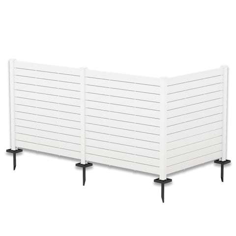 A white outdoor privacy fence with horizontal slats, supported by vertical posts. The fence is equipped with black metal stakes at the bottom for easy ground installation, making it suitable for defining spaces in gardens or patios.Elegant White Outdoor Privacy Fence. outdoor privacy fence, white fence, horizontal slat fence, garden fencing, easy - install fence. L shape.